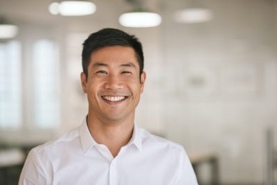 adult man smiling with teeth